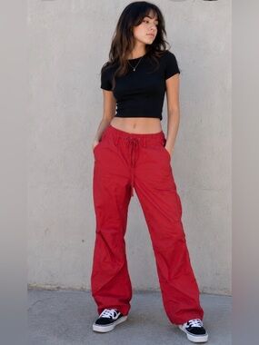 IZod red utility cargo pants. Women’s size 10, can be worn as pants or Capri.